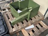 a pallet that has a green box on top of it