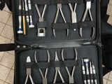 a suitcase with a bunch of tools inside of it