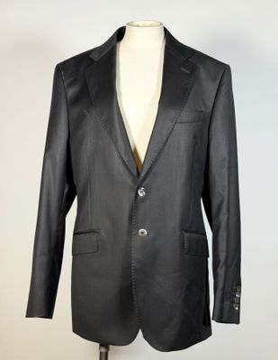 MADE IN ITALY. Un costume noir comprenant une veste et un pa…