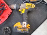 a cordless drill that is sitting on top of a table