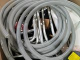 a box with a bunch of hoses inside of it