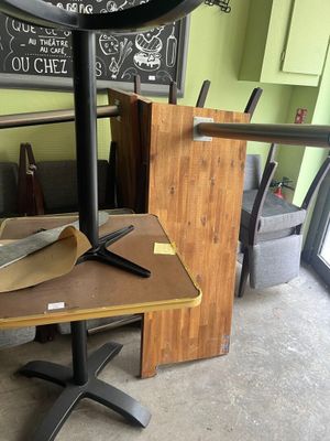 a table with a clock on it and a knife on it