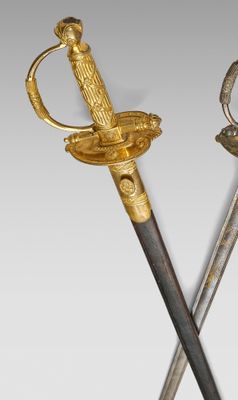 deux épées, l'une avec une poignée en or et l'autre avec une poignée en argent