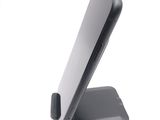 a cell phone that is sitting on top of a stand