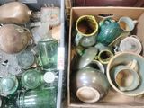 a box full of glass and other items in it