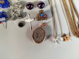 many different types of jewelry on the table