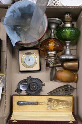 a box full of assorted items including a clock and other items