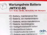 a label for a battery that is on the back of a box