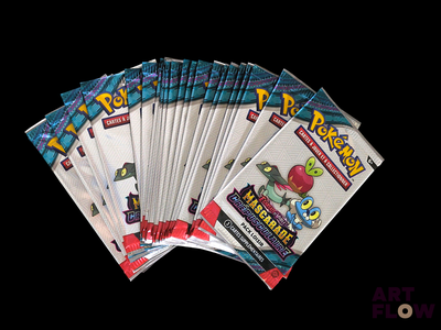 several packs of pokemon trading cards are stacked on top of each other