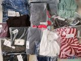 many different types of clothing in a plastic bag