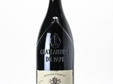 a bottle of wine that is sitting on a table