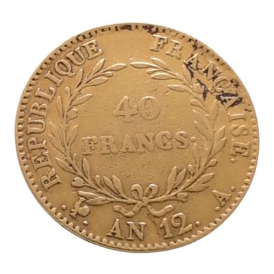 l'image d'une pièce d'or ornée d'une couronne