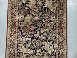 an oriental rug with a floral design on a white background