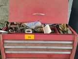 a red tool box with a lot of tools in it