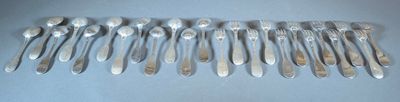 a lot of spoons that are sitting on a table