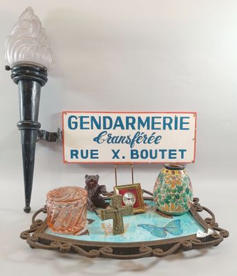 a sign that says gendarmerie and a bear on a boat