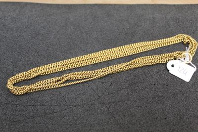 a gold chain with a heart charm on it