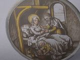 a picture of a picture of a man and a woman sitting in a chair