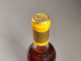 a bottle of wine that is sitting on a table