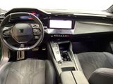 a picture of the interior of a car with a steering wheel and dashboard