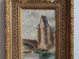 une peinture à l'huile représentant un château, posée sur une table en bois près d'un mur