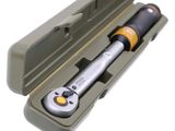 a tool in a case that is open on a white background