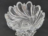 an image of a clear glass bowl on a black background
