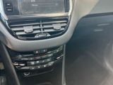 the interior of a car with a dashboard and steering controls