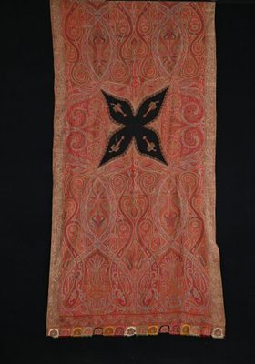 an orange and black scarf with a black butterfly on it