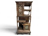 a wooden cabinet with a clock on top of it