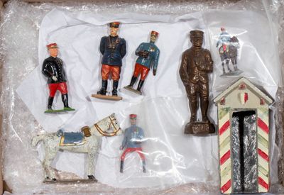 a box of toy figurines in the shape of soldiers