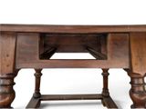 a wooden table with a drawer on top of it
