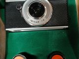 a green case with a camera inside of it