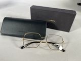 Lunettes Michael Korsch noires et dorées avec étui assorti