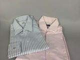 three men ' s dress shirts on a gray surface