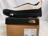 the north face shoes are on top of a box on a white surface