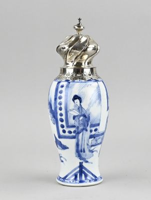an image of a blue and white vase with a woman on it