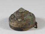 an antique brass incense box with a lid and a handle