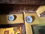 two plates that are on the wall of a room