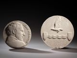 une image représentant une pièce de monnaie sur laquelle figurent un homme et un oiseau