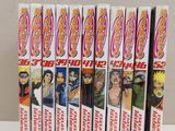 several vhss of anime comics are lined up on a white table