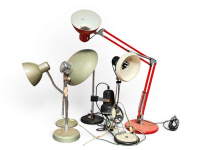 a lot of different types of lamps that are on the table