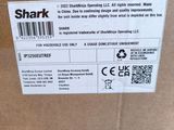 a close up of a cardboard box with a sticker on it
