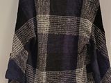 a coat hanging on a wall in a room