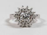 an image of a diamond ring on a white surface