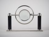 an image of a magnifying mirror on a stand with two black poles