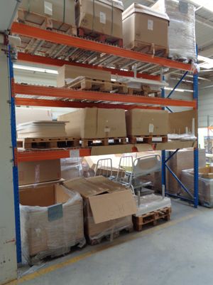 many boxes and boxes on the shelves in the warehouse