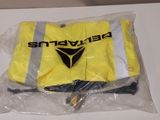 a yellow life jacket on a plastic bag on a table