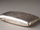 a silver case that is sitting on a table