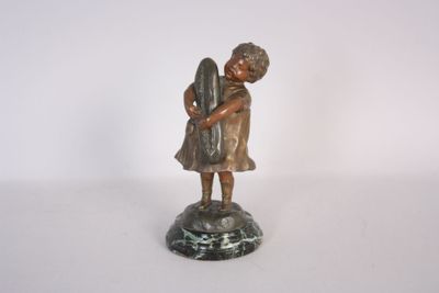 bronze figurine of a girl holding a bird on a marble base